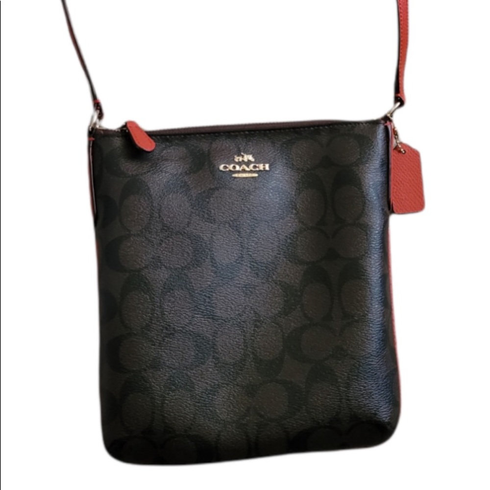 This a a cross body Coach bag that has been used, but in great condition.